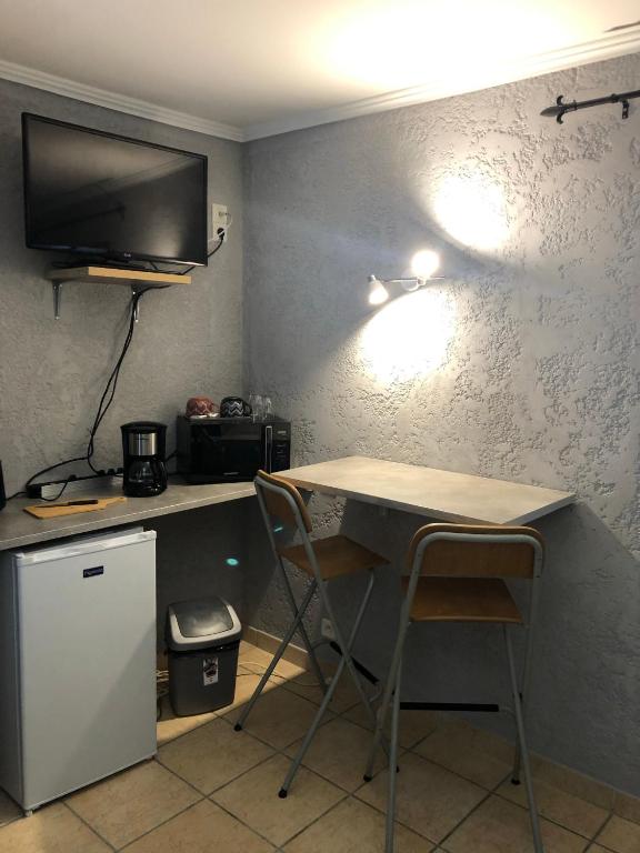 Kuchyň nebo kuchyňský kout v ubytování Chez Anidé