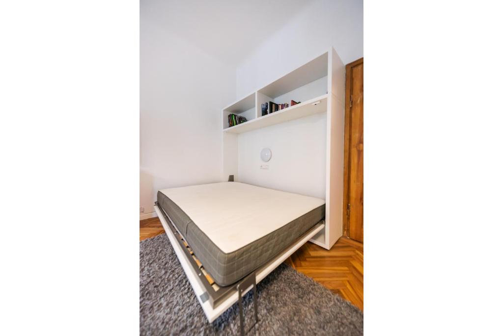 Posteľ alebo postele v izbe v ubytovaní Old Town Market Place Apartment