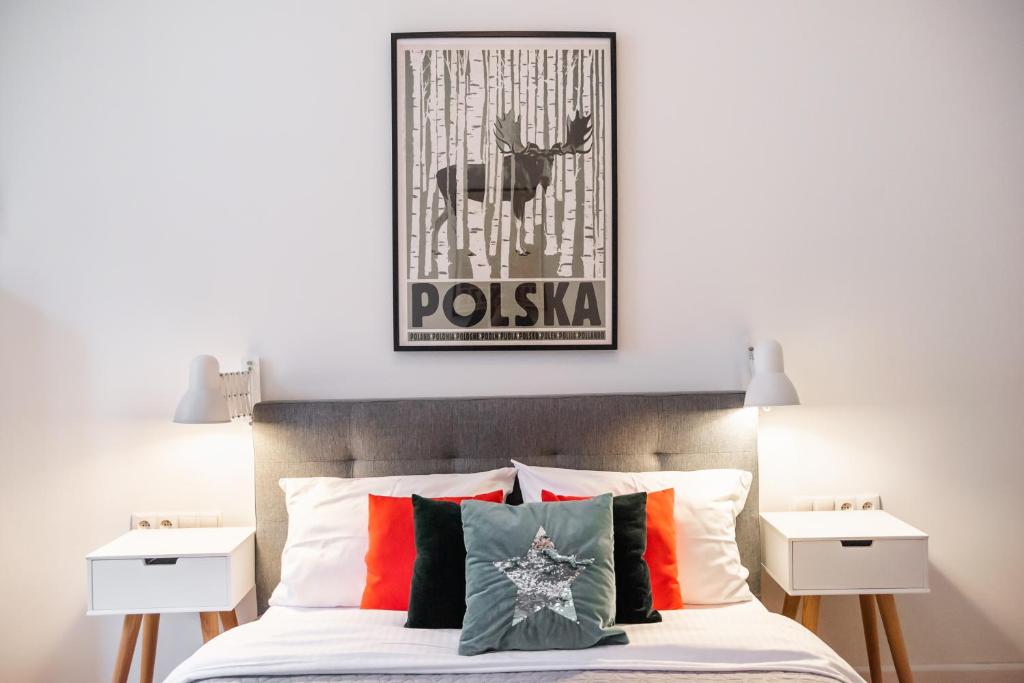 Posteľ alebo postele v izbe v ubytovaní Old Town Market Place Apartment