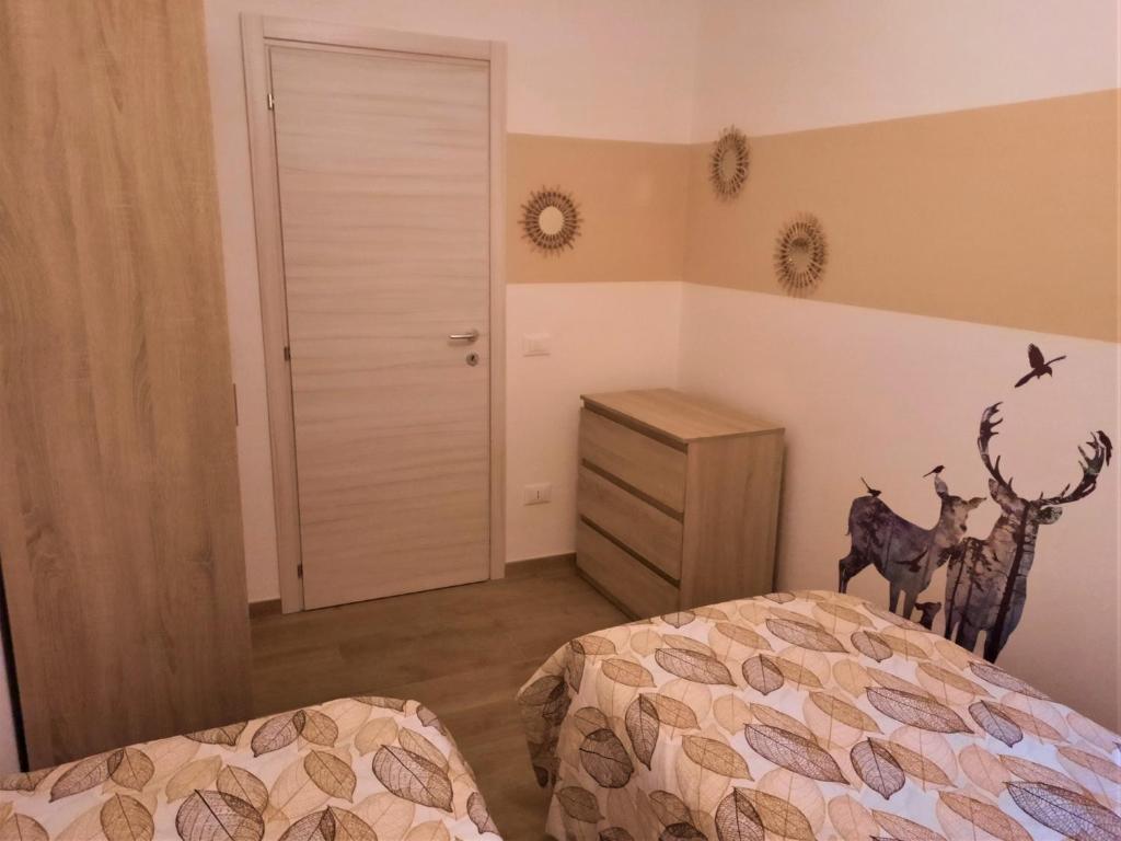 Postel nebo postele na pokoji v ubytování Casa MAGNA