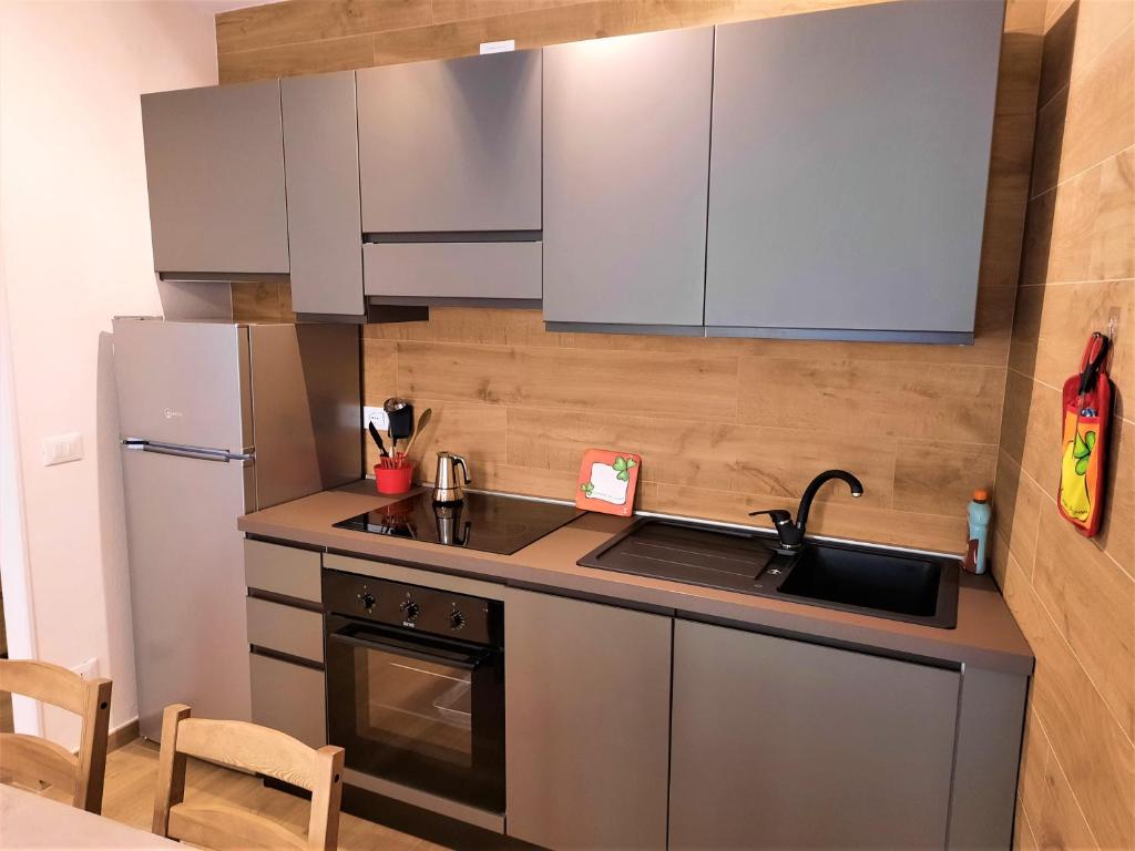 Kuchyň nebo kuchyňský kout v ubytování Casa MAGNA