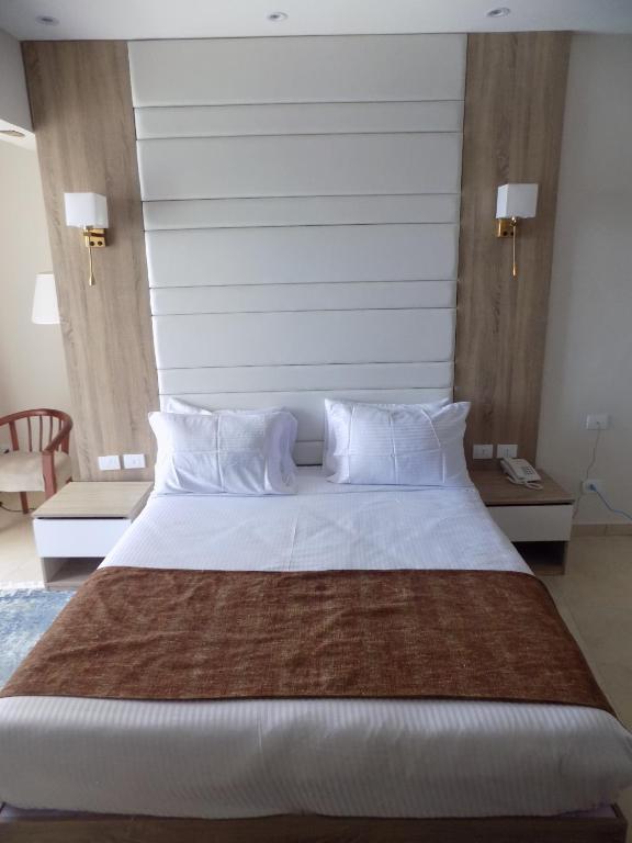 Postel nebo postele na pokoji v ubytování Jewel Sharm El Sheikh Hotel