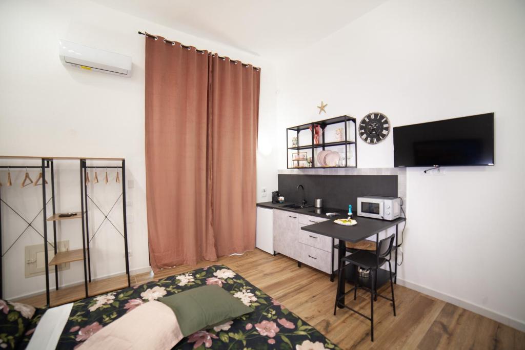 Telewizja i/lub zestaw kina domowego w obiekcie Il rifugio in Borgata