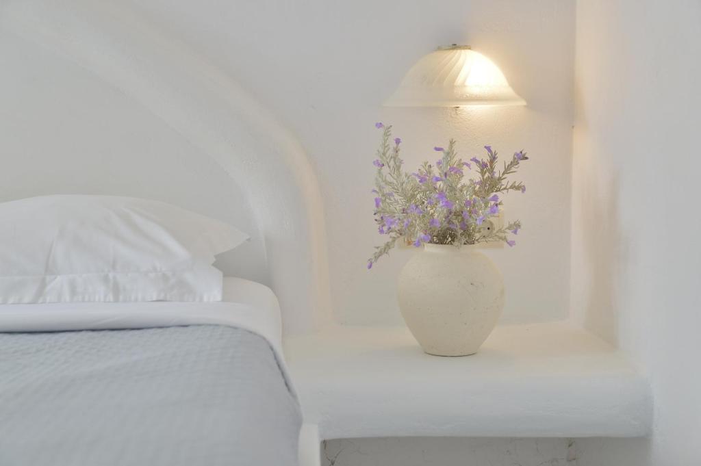 Postel nebo postele na pokoji v ubytování Hotel Mediterranean