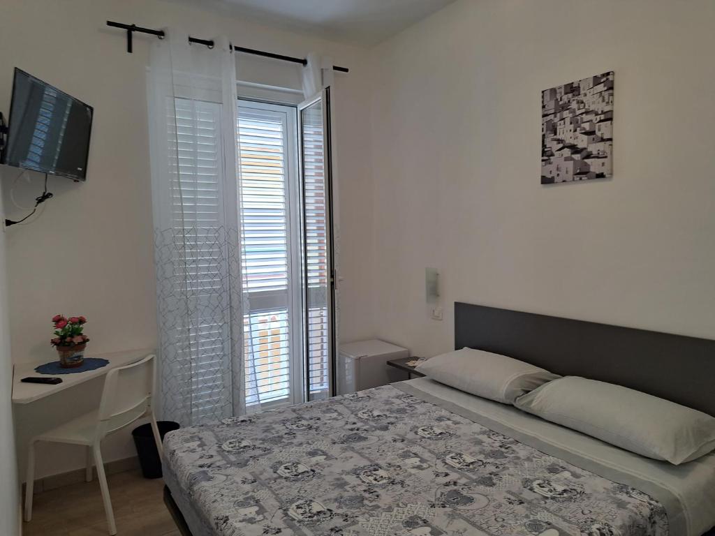 Postel nebo postele na pokoji v ubytování Da Orazio