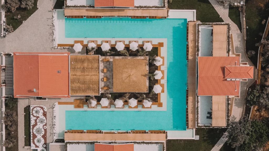 an overhead view of a resort with a swimming pool at The Pearl Ölüdeniz in Oludeniz