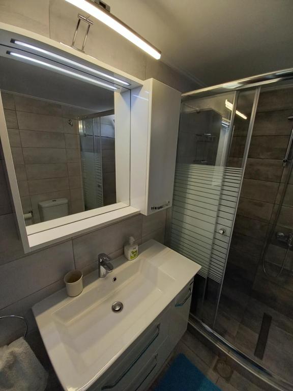 Kúpeľňa v ubytovaní Ekie Apartment with sea view
