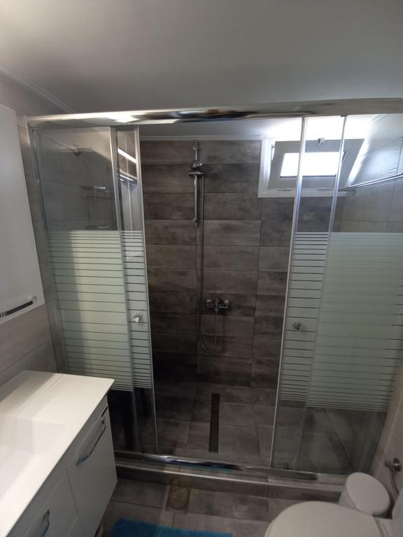 Kúpeľňa v ubytovaní Ekie Apartment with sea view