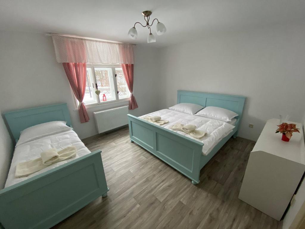 Postel nebo postele na pokoji v ubytování CHalupa Relax