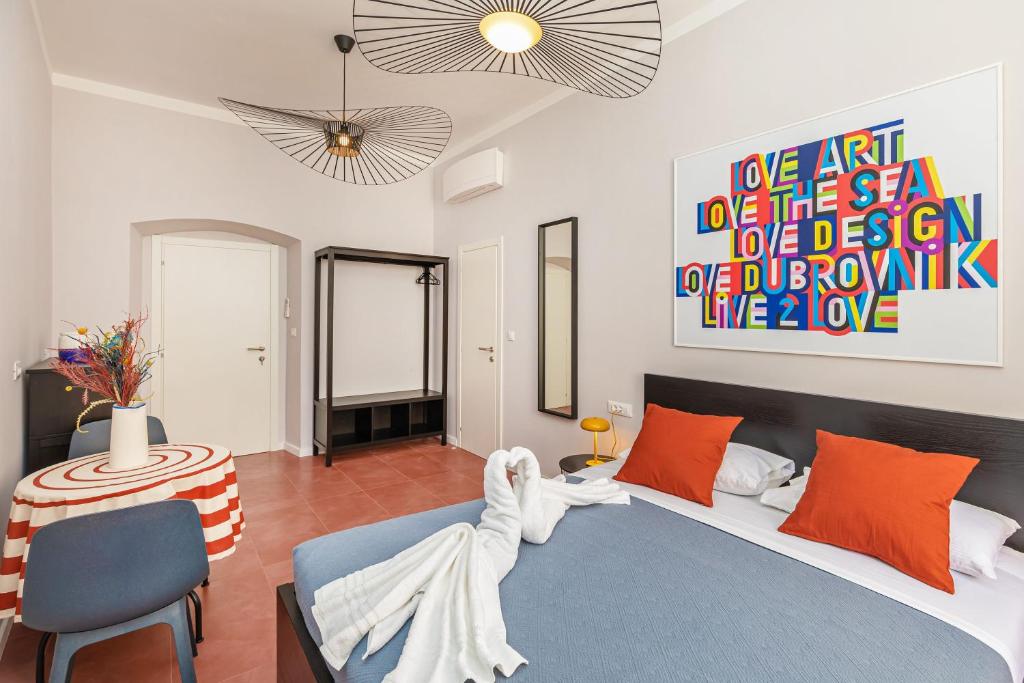 Postel nebo postele na pokoji v ubytování Cap Rooms