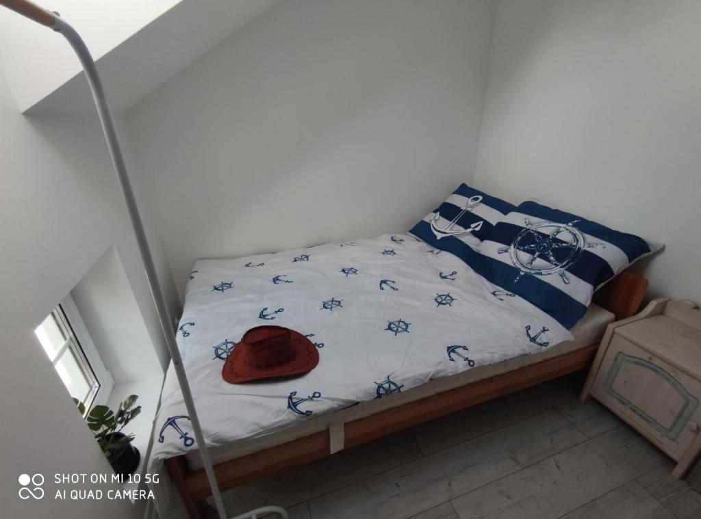 Postel nebo postele na pokoji v ubytování Ster na Mazury - apartamenty Mrągowo