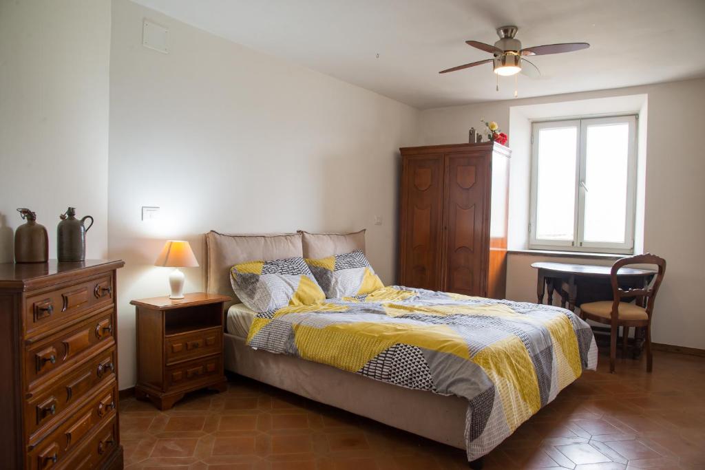 A bed or beds in a room at Heritage mountain top Villa near Rome w/ Pool & Panoramic views