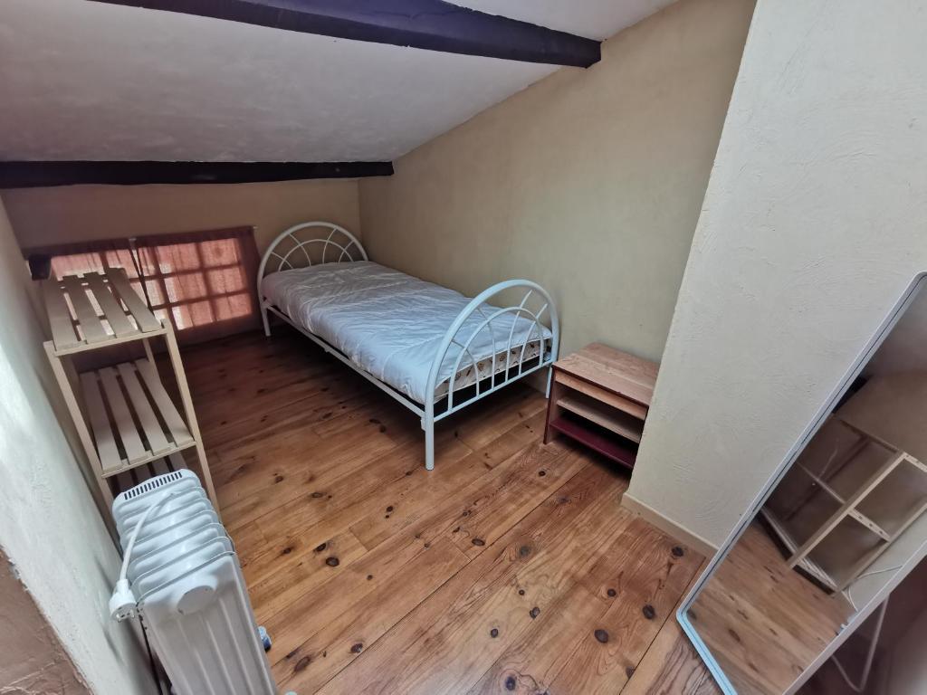 Łóżko lub łóżka w pokoju w obiekcie Les gîtes de la nouvelle vie