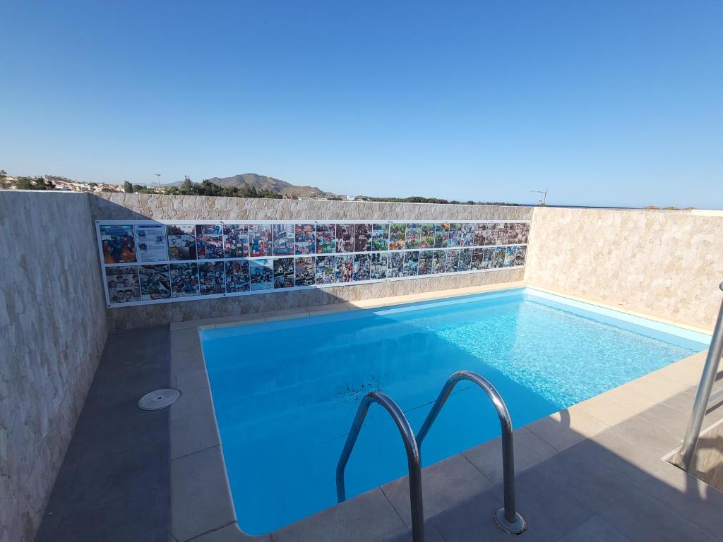 Bazén v ubytovaní ¡Espectacular Marvel®Ático con piscina privada en primera línea de Vera-Playa! alebo v jeho blízkosti