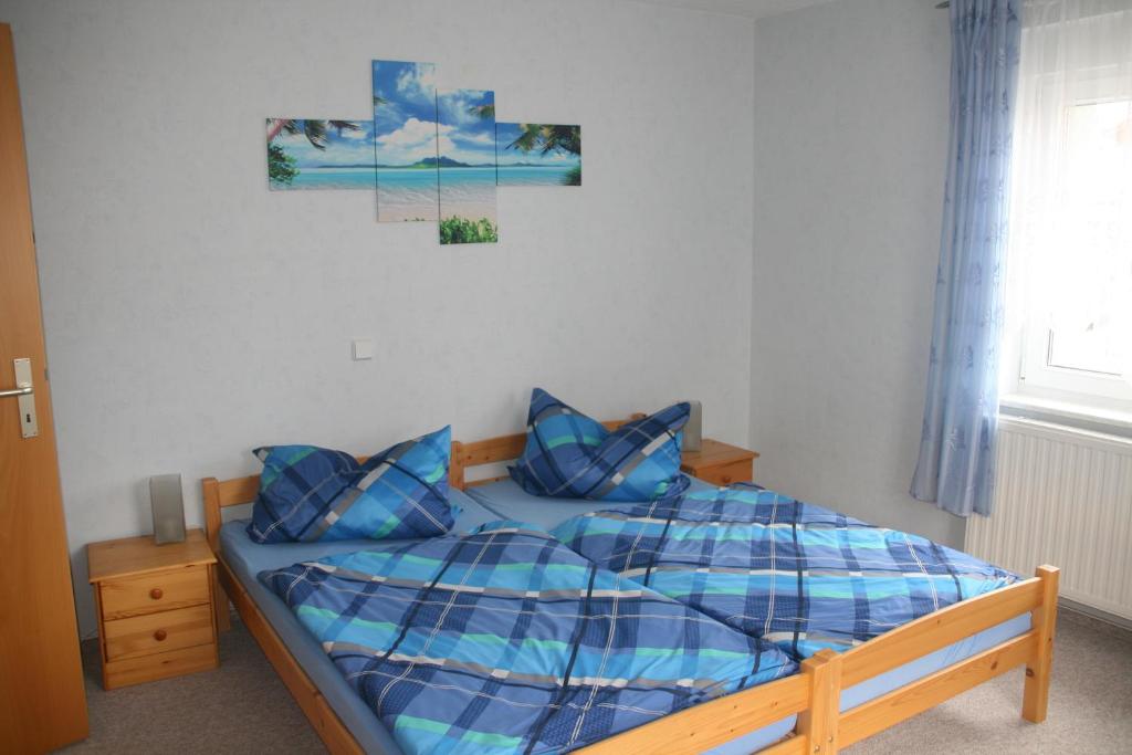Postel nebo postele na pokoji v ubytování Apartment Schinkmann