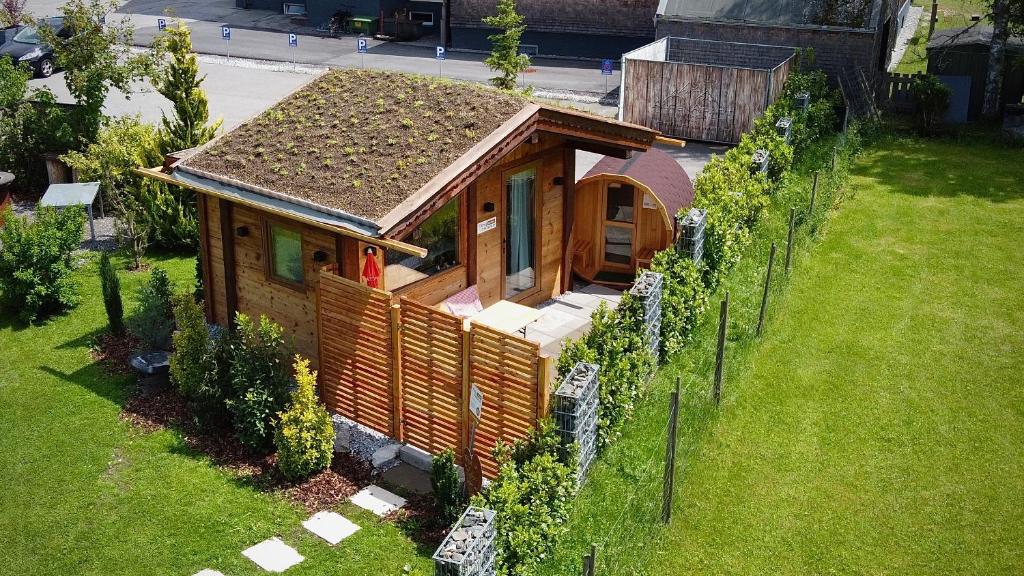 an overhead view of a small house in a yard at Tiny House Singer - contactless check-in - Sauna in Ehenbichl