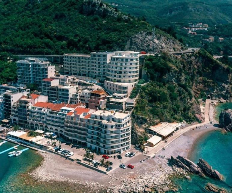 an aerial view of a resort on a beach at Apartment Studio Premier in Rafailovici