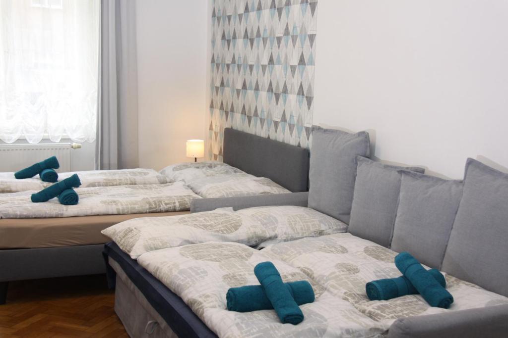 Postel nebo postele na pokoji v ubytování Central Prague Wenceslas Square Apartments