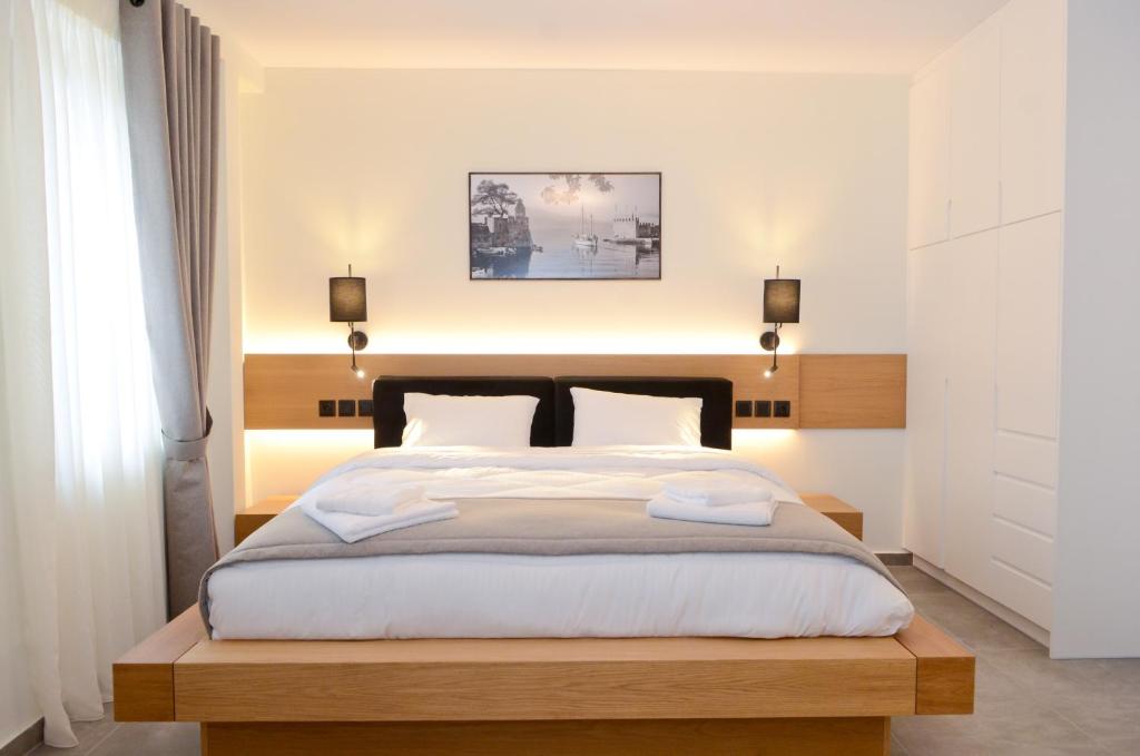 Letto o letti in una camera di Roloi suites