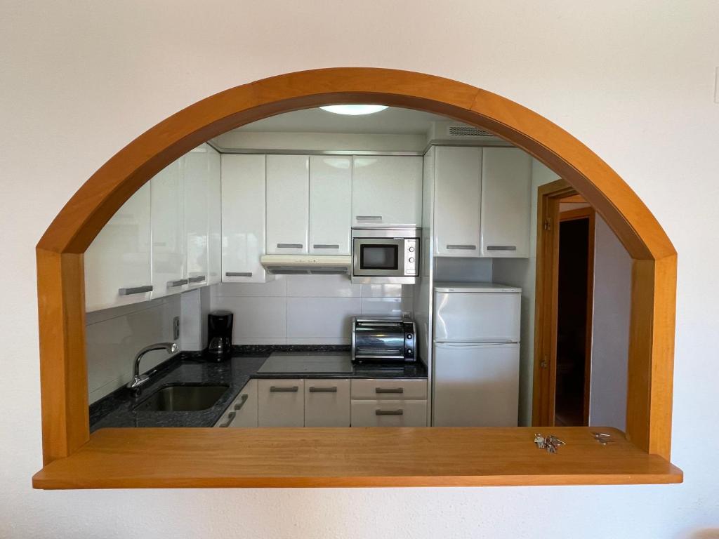 A kitchen or kitchenette at Myhost la Dorada frente al mar