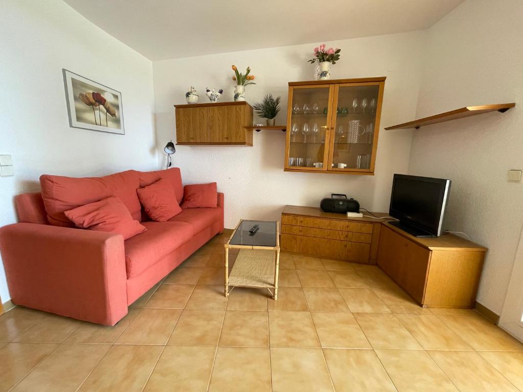 A television and/or entertainment centre at Myhost la Dorada frente al mar