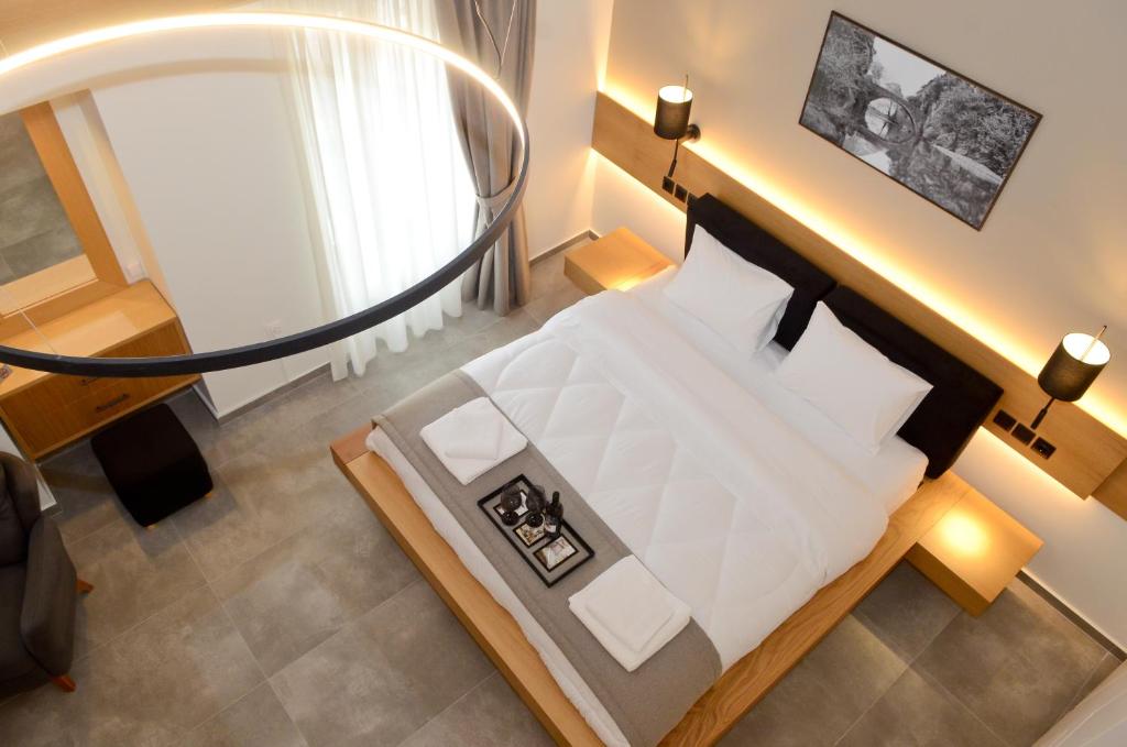 Letto o letti in una camera di Roloi suites