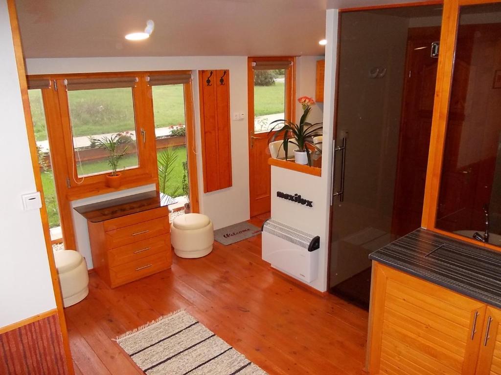 Kuchyň nebo kuchyňský kout v ubytování Maxilux Studio