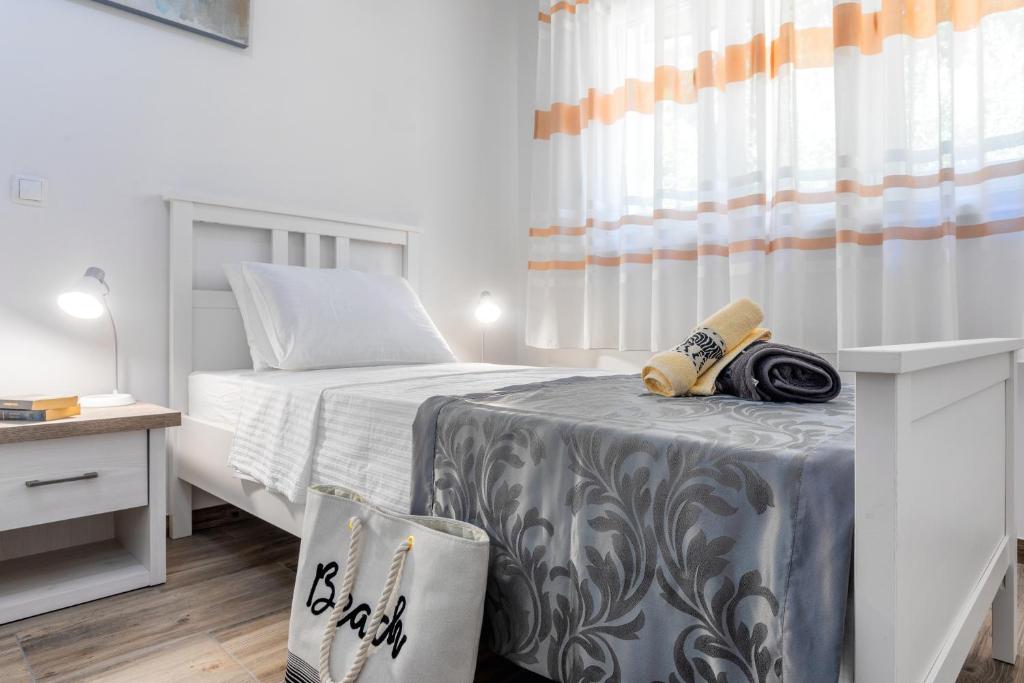 Postel nebo postele na pokoji v ubytování Hidden Gem - ZF Hvar