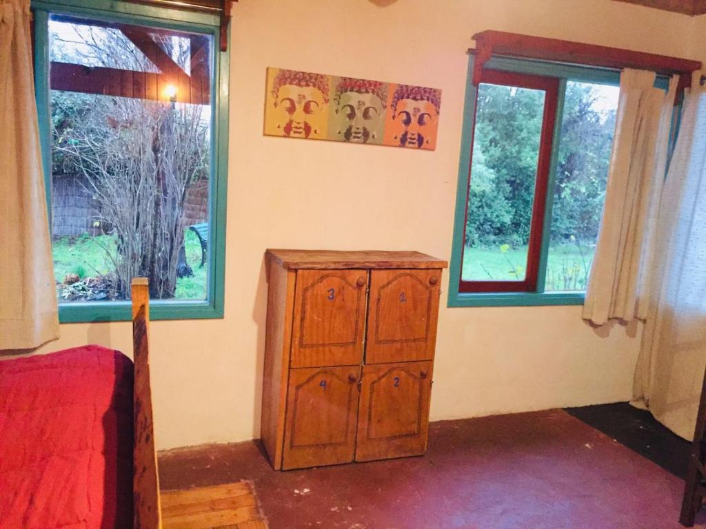 Uma cama ou camas num quarto em Hostel Raíz