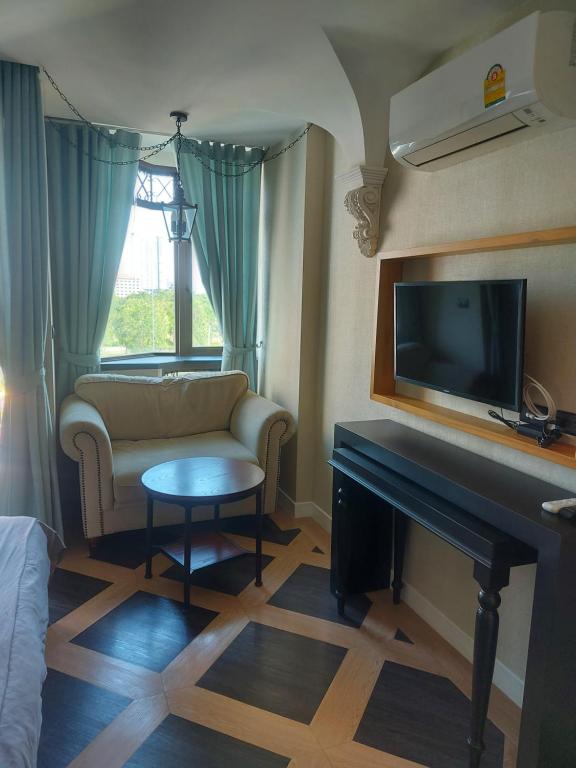 Et tv og/eller underholdning på Espana Resort Pattaya Jomtien