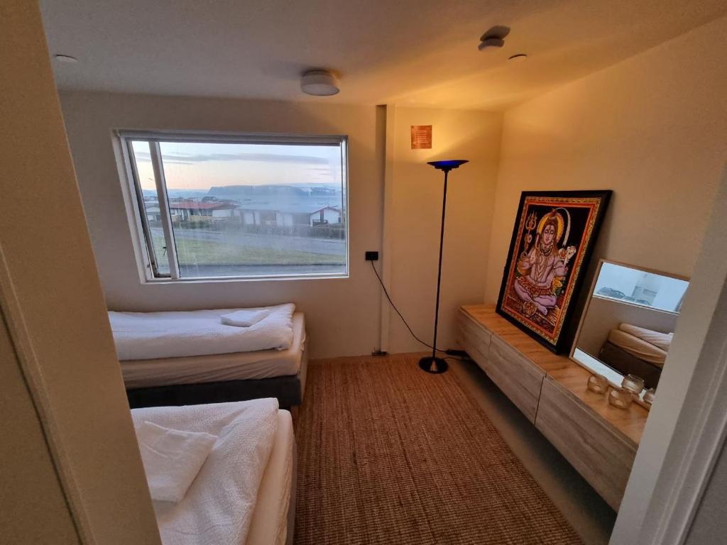 Postel nebo postele na pokoji v ubytování Dúfan Apartments