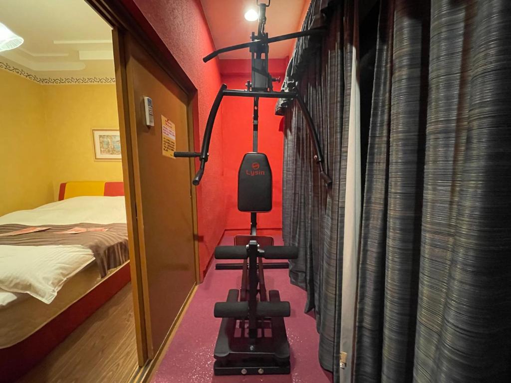 Postel nebo postele na pokoji v ubytování HOTEL マナティ