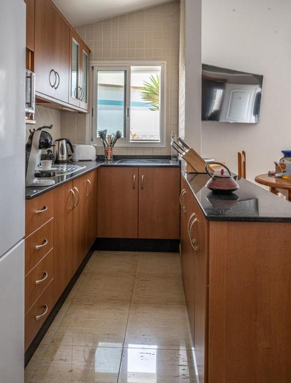 Kuchyňa alebo kuchynka v ubytovaní Villa La Maja Beachfront