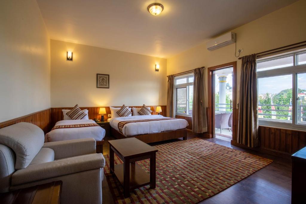 Postel nebo postele na pokoji v ubytování Siddhartha Boutique Hotel, Boudha
