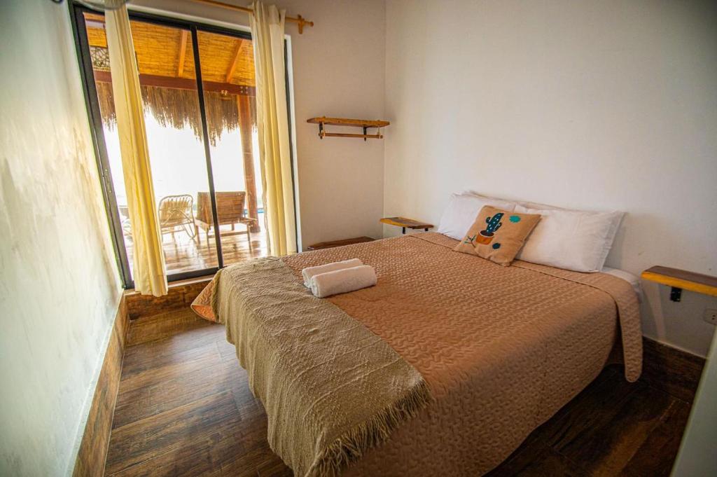 Postel nebo postele na pokoji v ubytování Hotel Boutique Beso de Sal