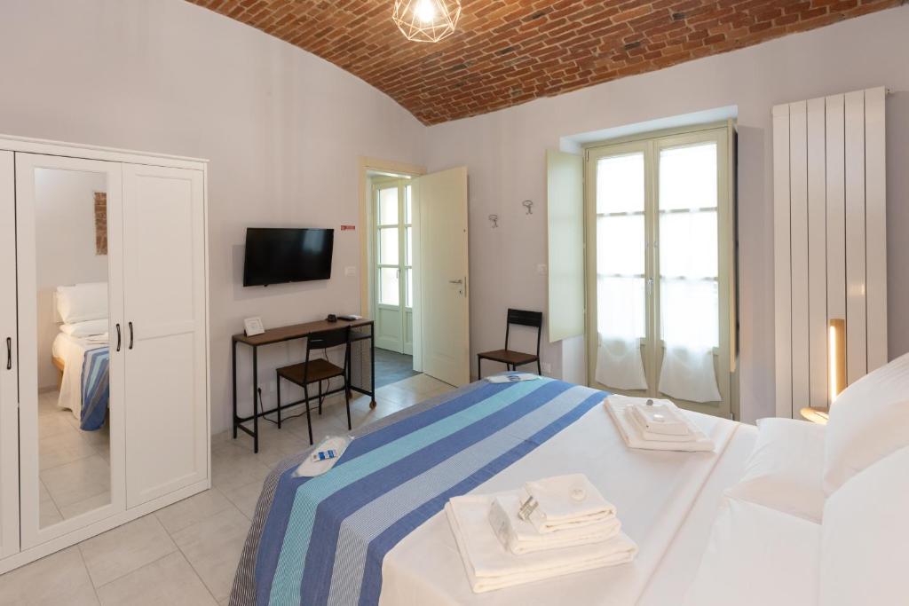 Cama o camas de una habitación en B&B Torino Arcuri