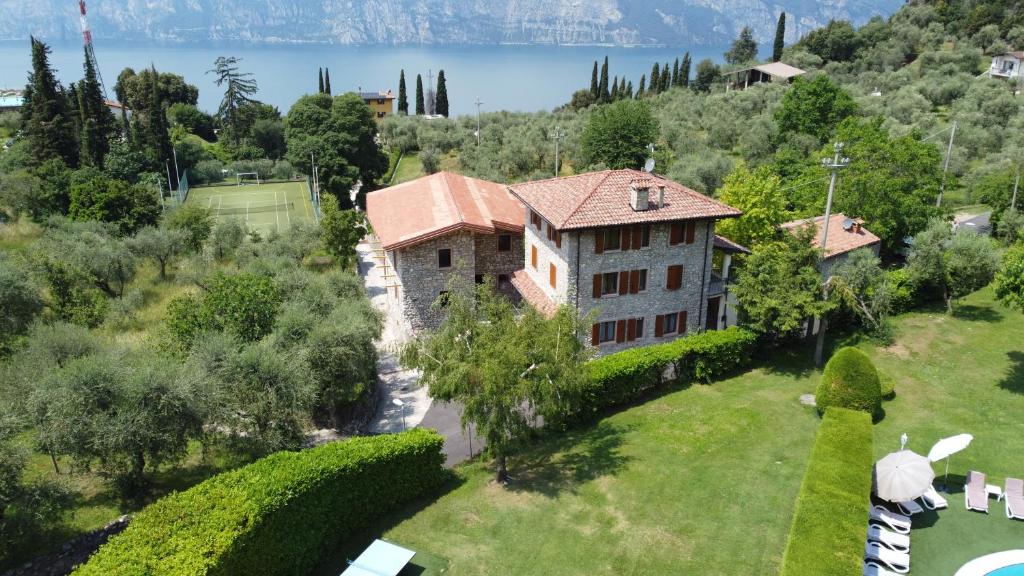 an aerial view of a house on a hill at Residence Val Di Monte in Malcesine