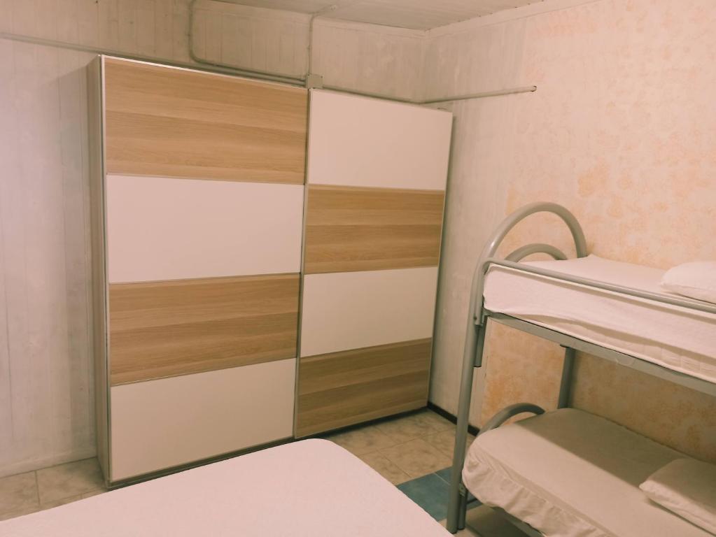 Postel nebo postele na pokoji v ubytování Camping Poseidonia