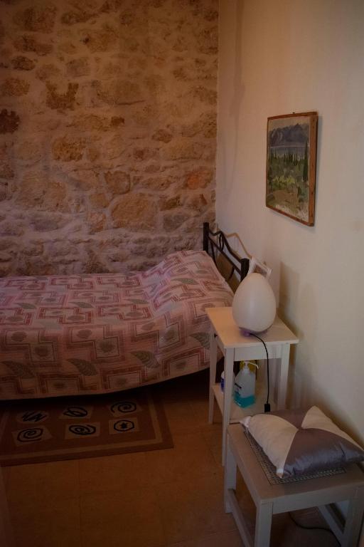 Postel nebo postele na pokoji v ubytování Michael Apartment