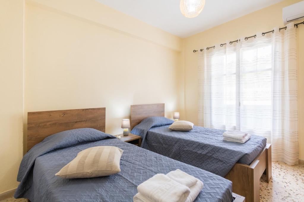 Postel nebo postele na pokoji v ubytování Cozy Platytera apartment