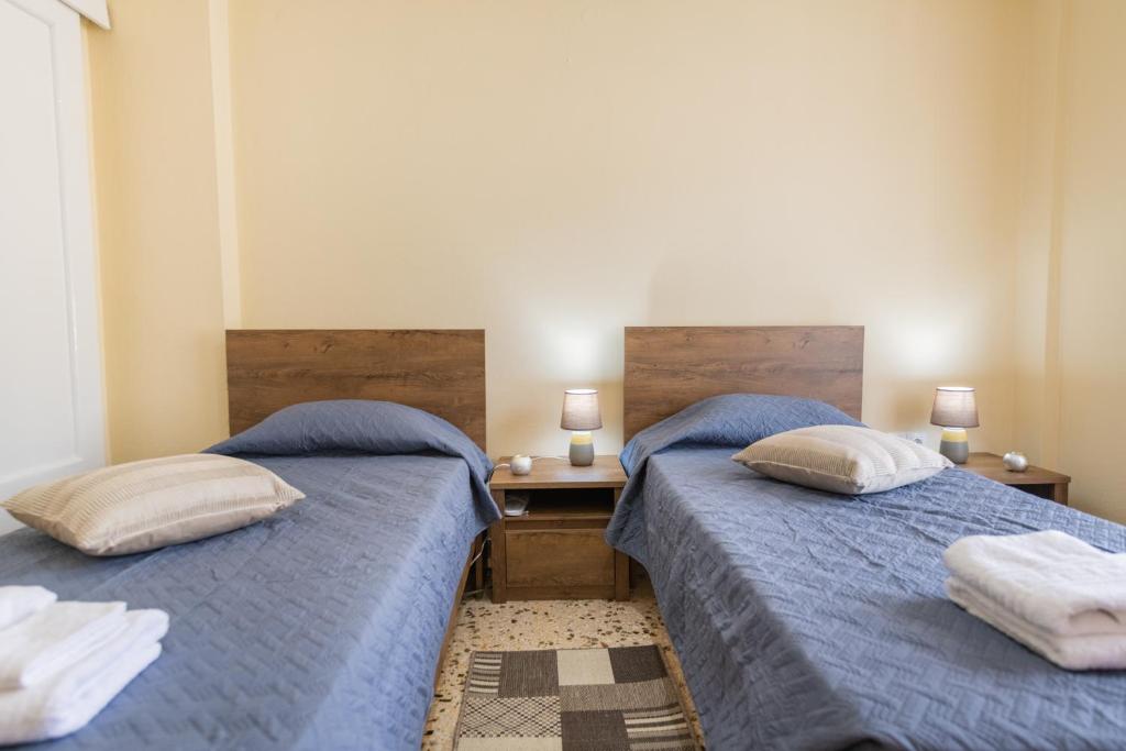 Postel nebo postele na pokoji v ubytování Cozy Platytera apartment