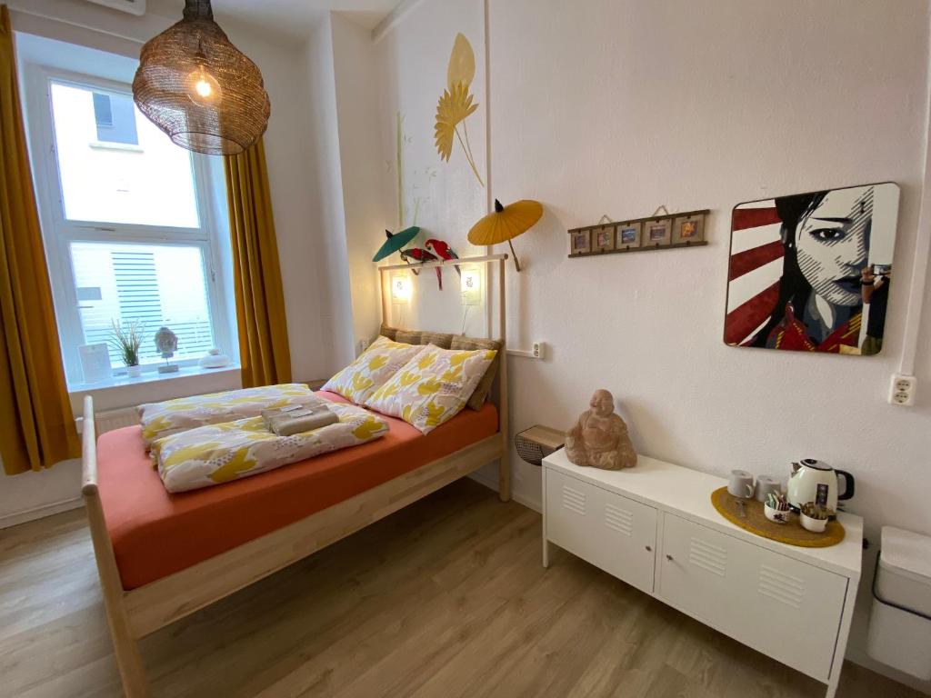 Postel nebo postele na pokoji v ubytování Kiez Hostel Berlin