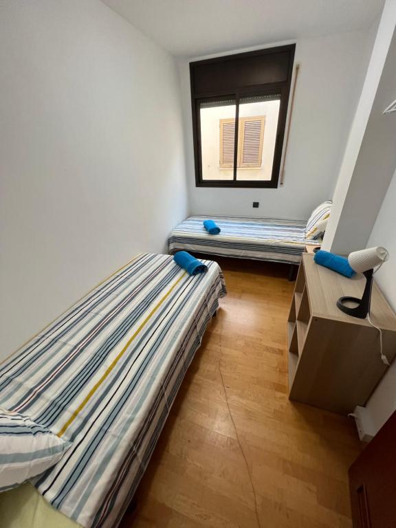 Posteľ alebo postele v izbe v ubytovaní La Chartreuse Apartament