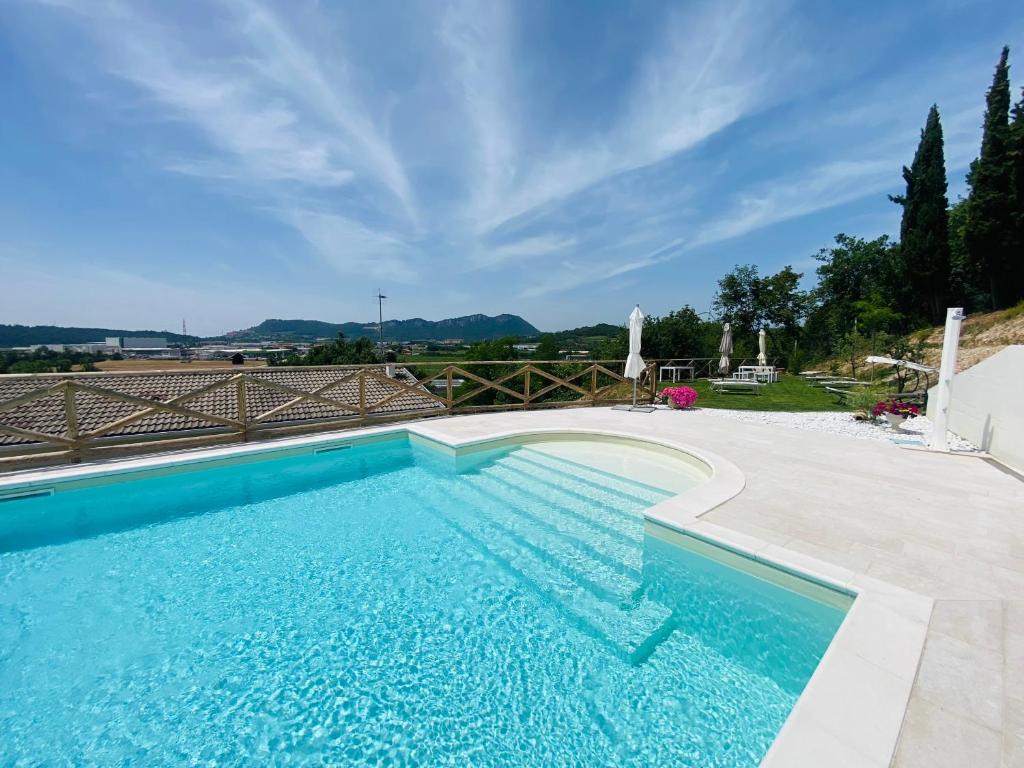 a swimming pool in a villa at Villa Poggio Ulivo Pool-Apartments in Rivoli Veronese