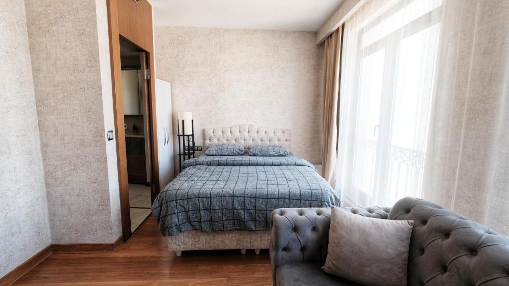 Postel nebo postele na pokoji v ubytování SABİHA GOKCEN İSTANBUL HOUSES Hotel