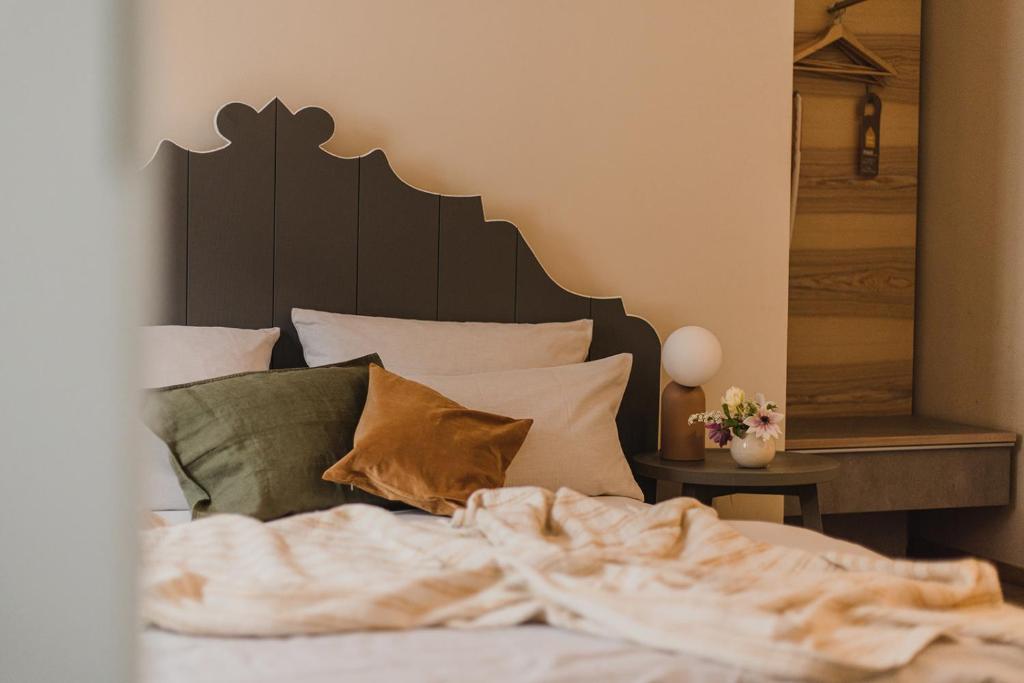 Postel nebo postele na pokoji v ubytování Hotel Stadthaus