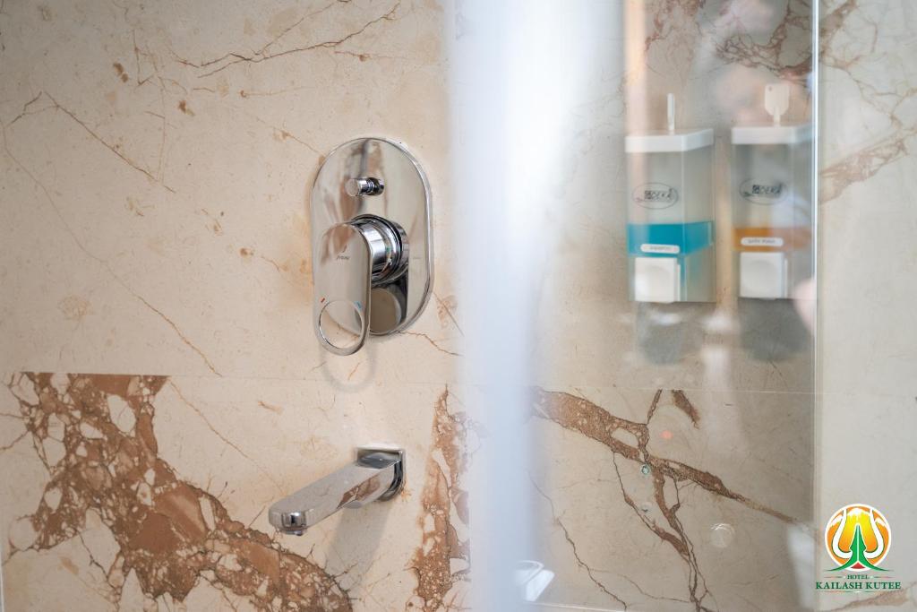 Koupelna v ubytování Hotel Kailash Kutee