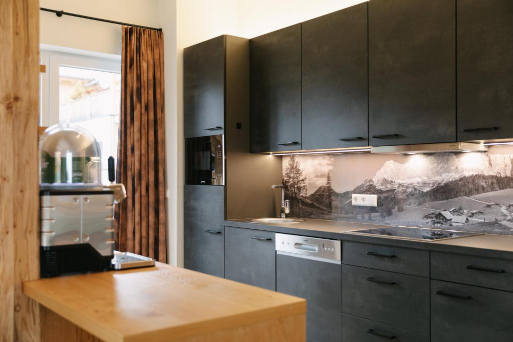 Cucina o angolo cottura di Chalet Village by Apart4you