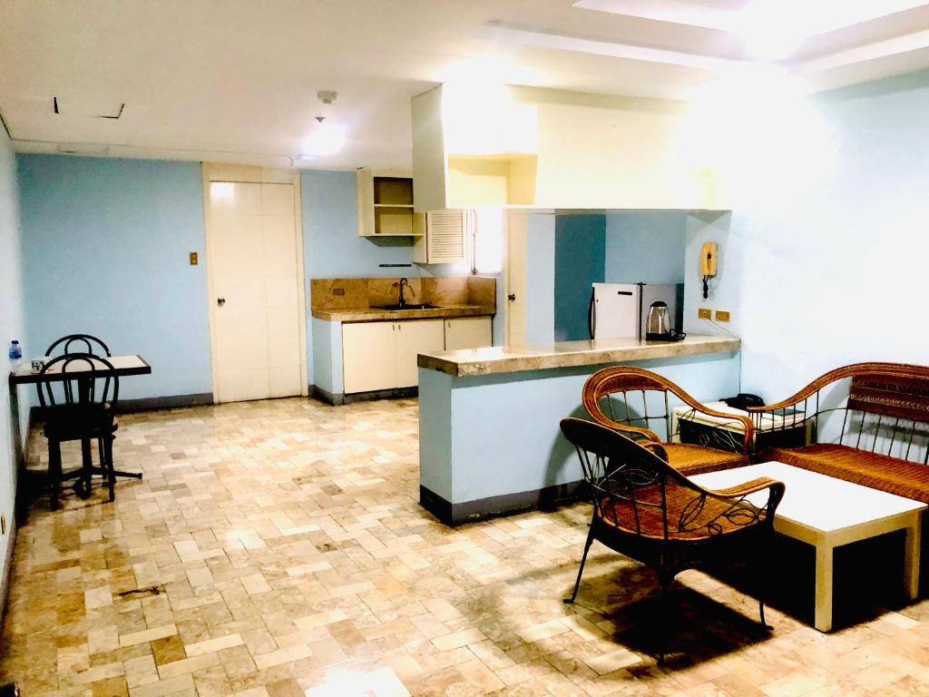 Kuchyň nebo kuchyňský kout v ubytování Benson Hotel San Juan CIty