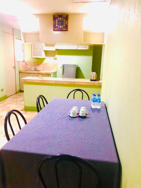 Kuchyň nebo kuchyňský kout v ubytování Benson Hotel San Juan CIty